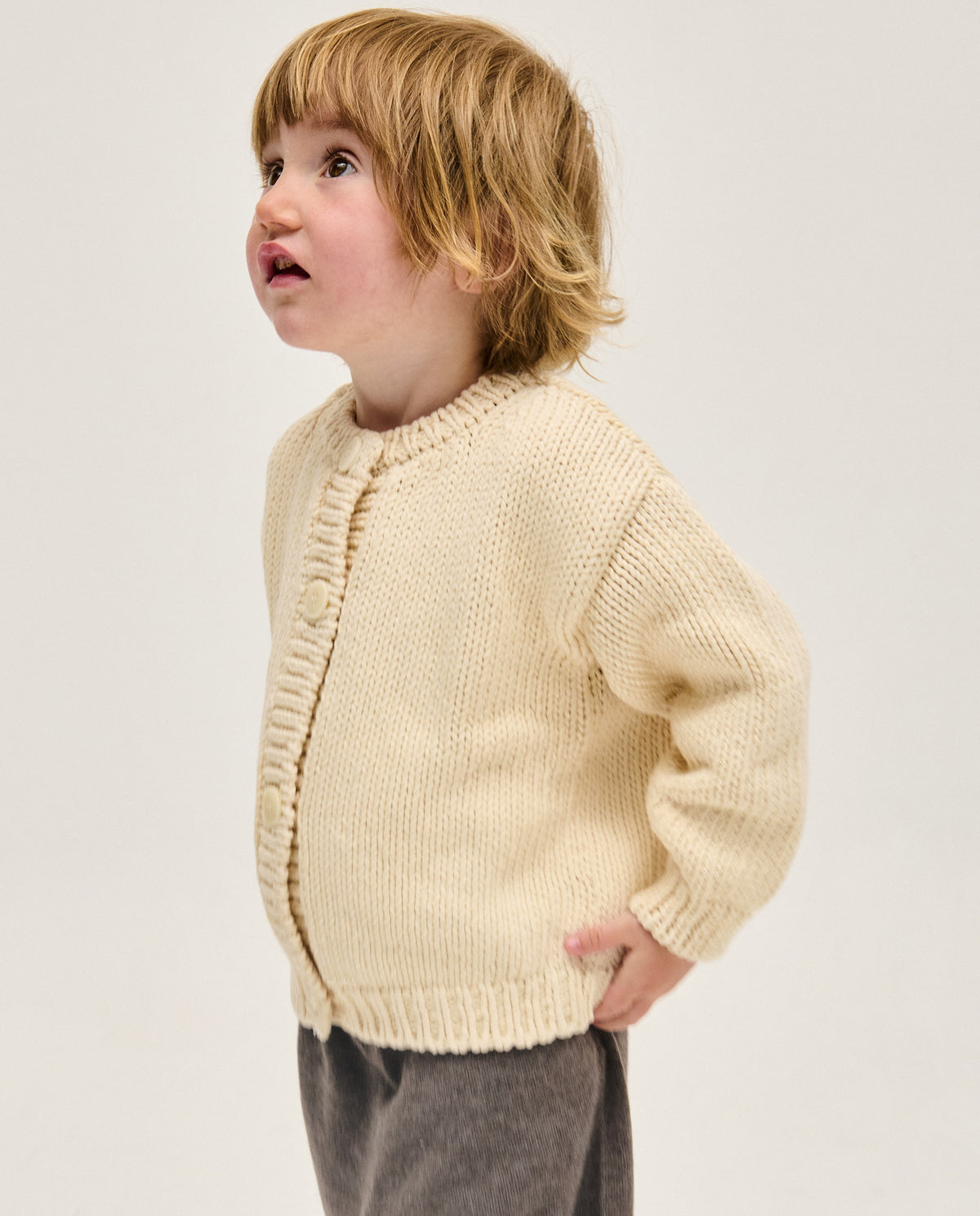 Kids' natural beige cardigan by Babaà, soft knit with button closure, perfect for casual or everyday wear.