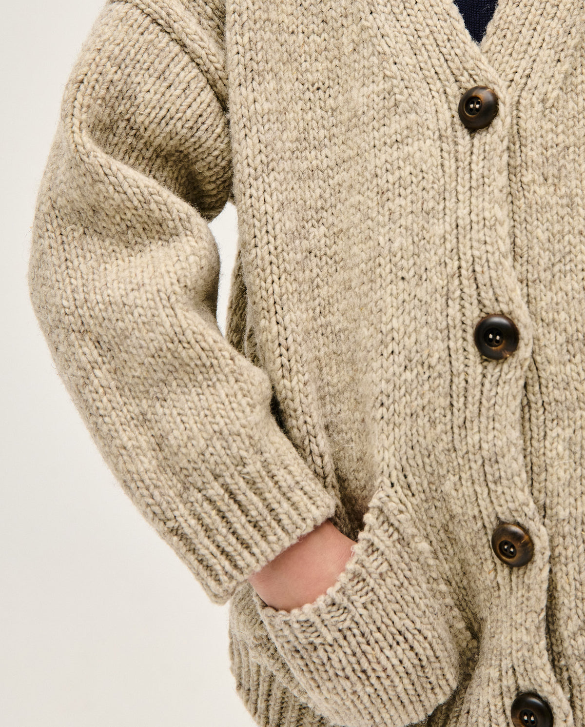 Kids' Babaà No17 Mist cardigan with soft knit fabric and button details, perfect for cozy, stylish children's wear.