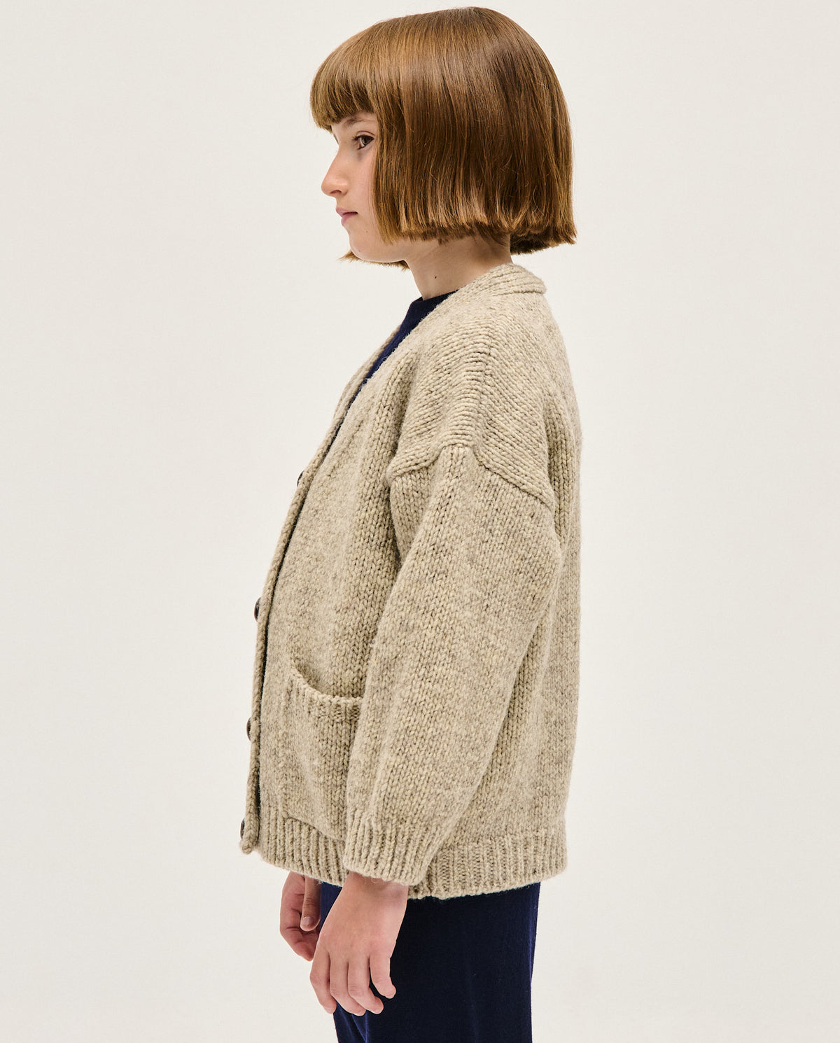 Kids' Babaà No17 Mist cardigan in soft, cozy fabric, featuring a stylish design with buttons and ribbed cuffs.