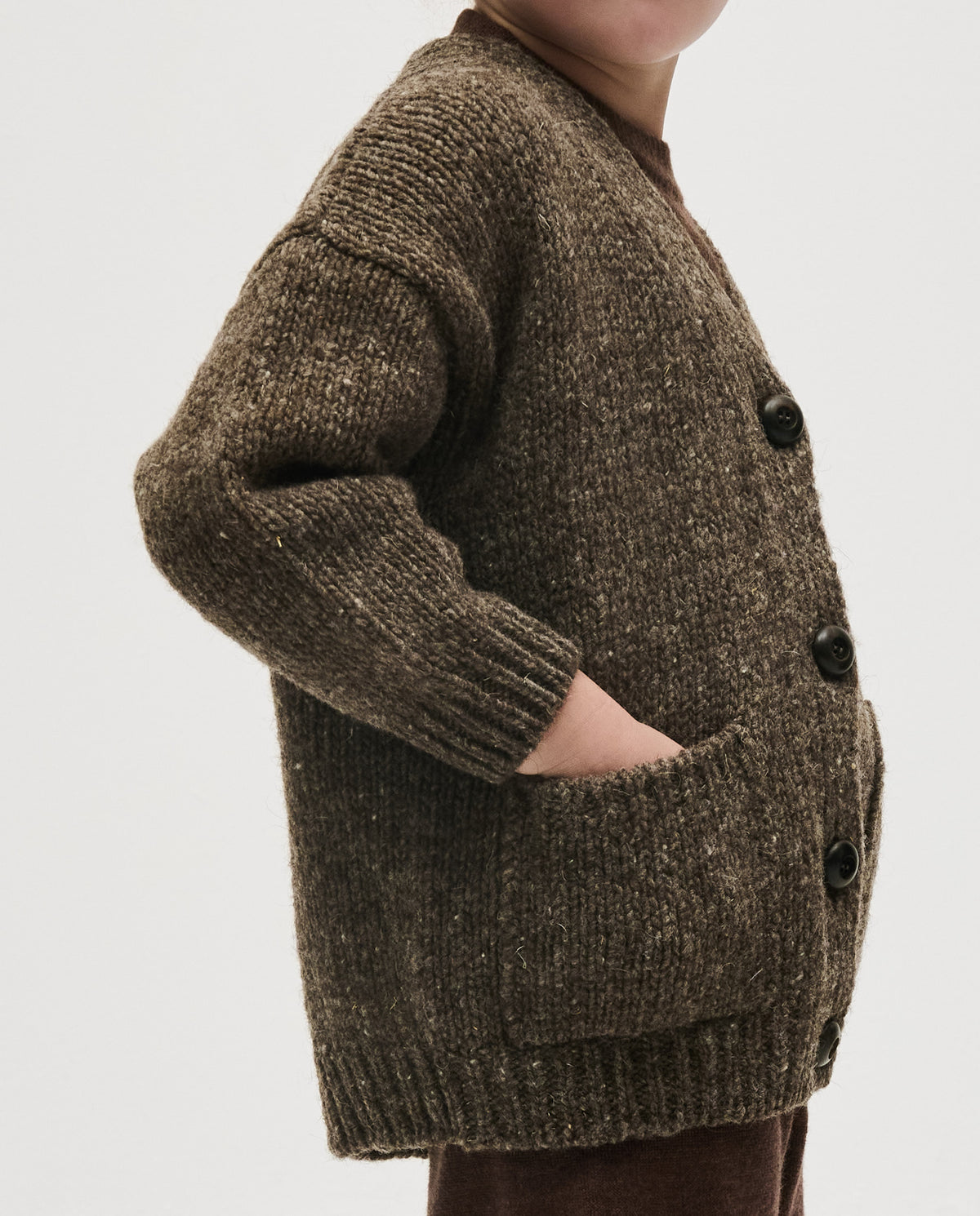 Kids' Babaà No17 oak cardigan with soft knit fabric, button closure, and cozy style for children.