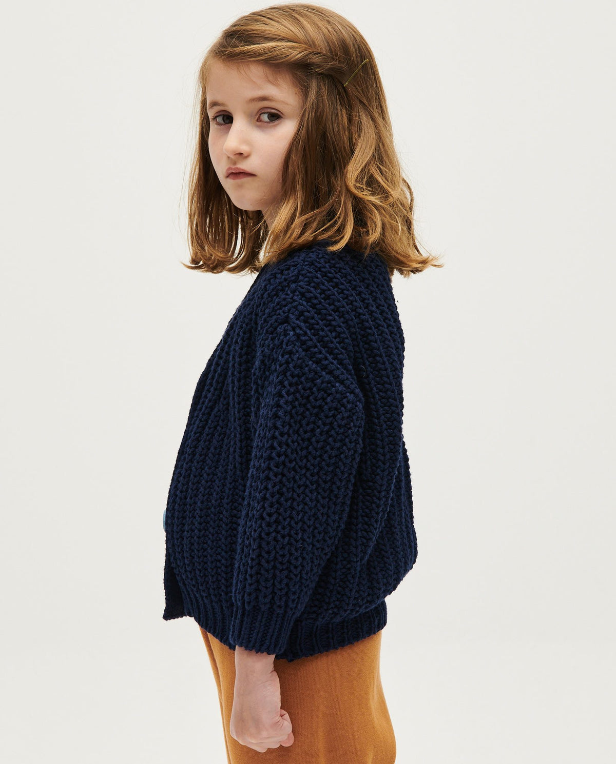 Navy Babaà kids' cardigan No18 with button closure, soft knit fabric, and ribbed cuffs, ideal for children.