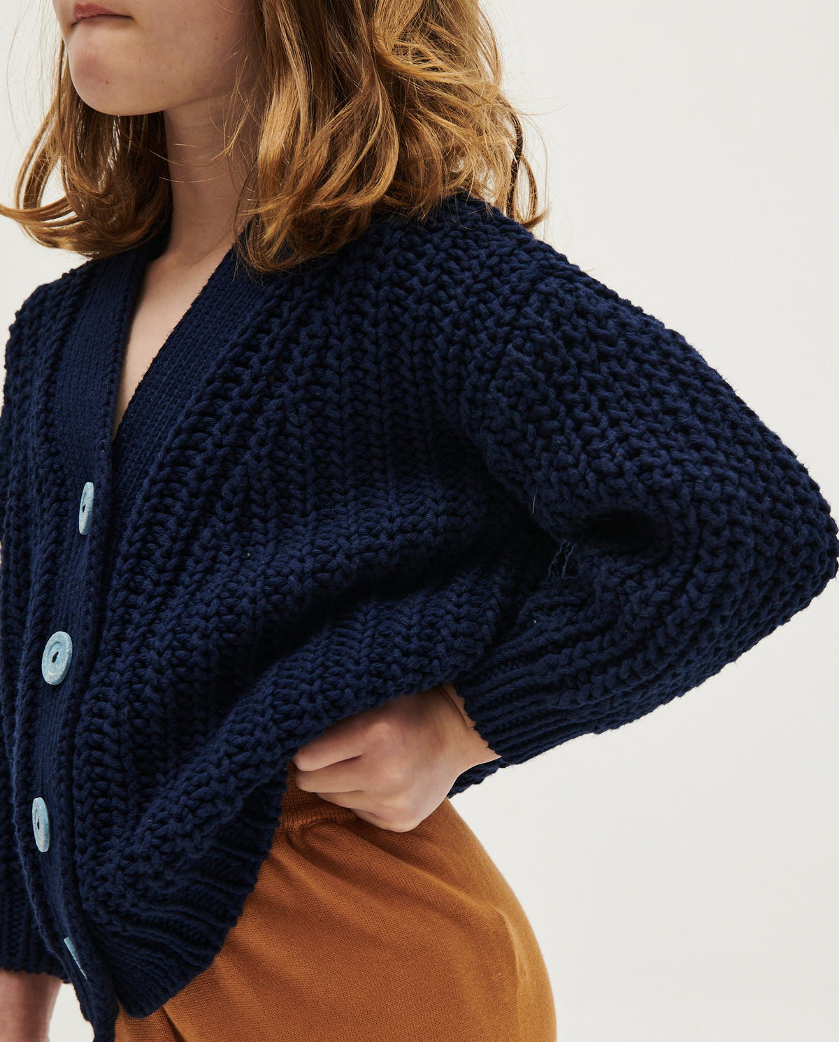 Navy kids' cardigan from Babaà with button-front, soft knit fabric, and long sleeves, perfect for children’s casual wear.