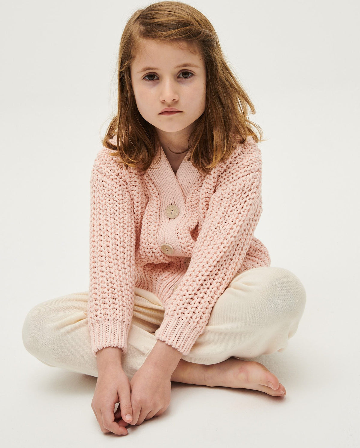 Kids' Babaà No18 Petal Plum cardigan featuring soft knit fabric and button closure, perfect for casual or dressy wear.