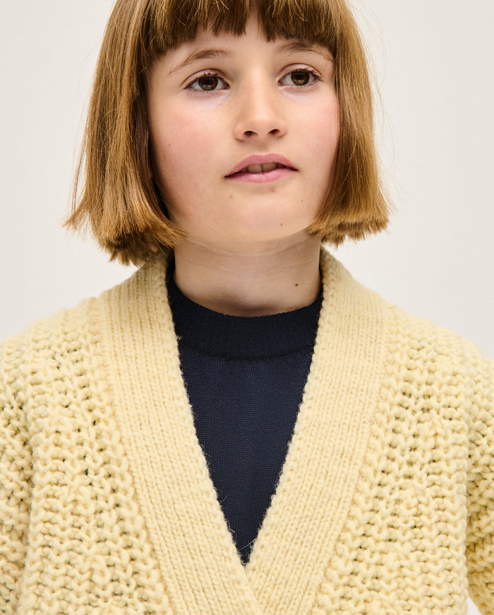 Kids' natural beige cardigan by Babaà, soft knit with button closure, perfect for children's casual and cozy style.