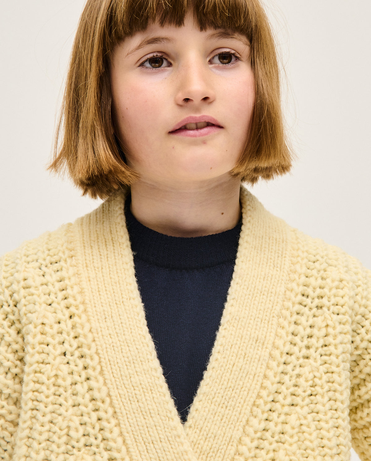 Kids' natural beige cardigan by Babaà, soft knit with button closure, perfect for children's casual and cozy style.