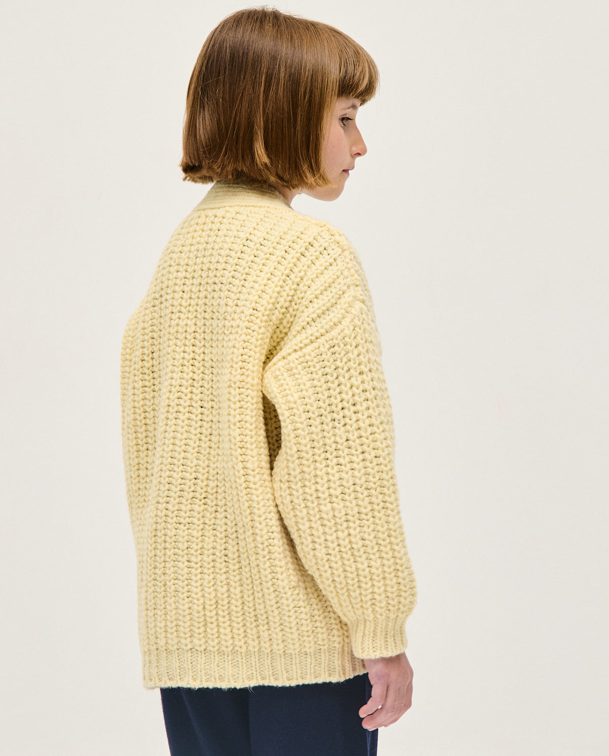 Baby girl's natural cardigan from Babaà, soft knit with long sleeves and button closure, perfect for casual wear.