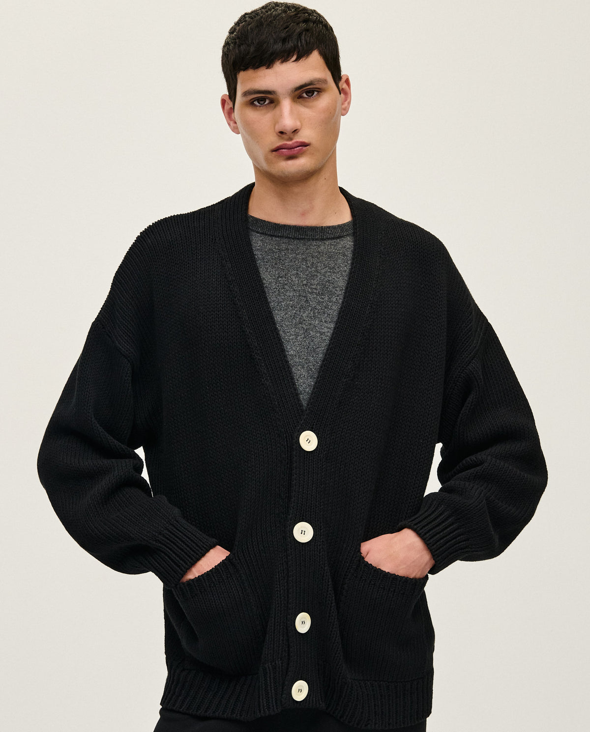 Black men's cardigan from Babaà, No16 style, featuring a comfortable knit design and front button closure.