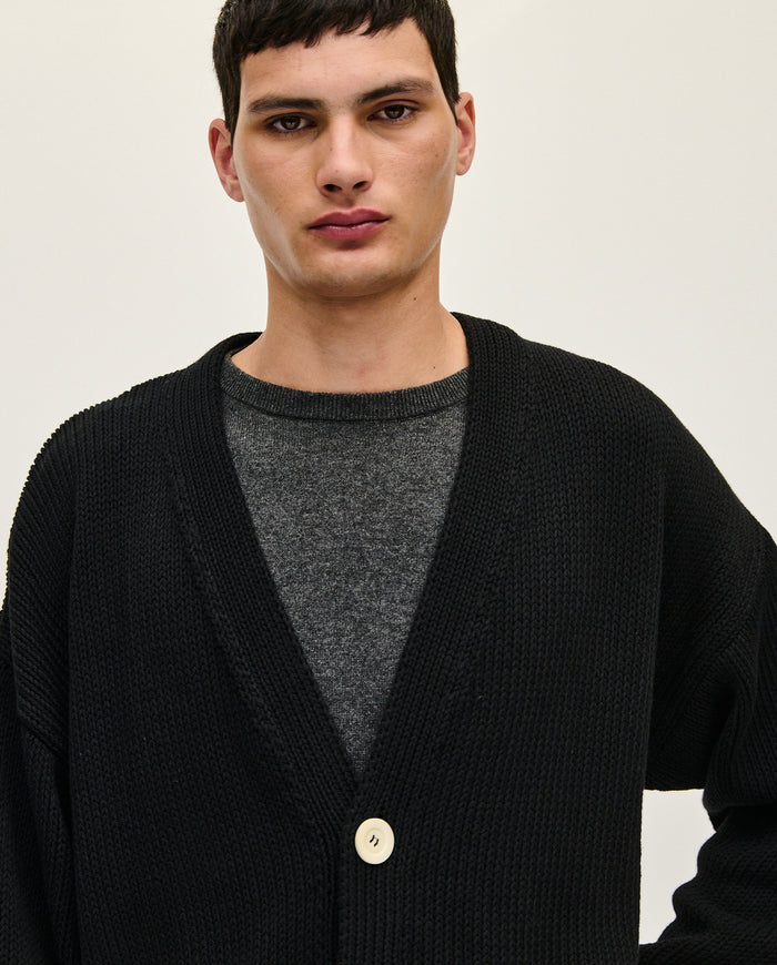 Black Babaà men's cardigan No16, featuring a cozy knit design, displayed on a neutral background with details of the fabric and fit.