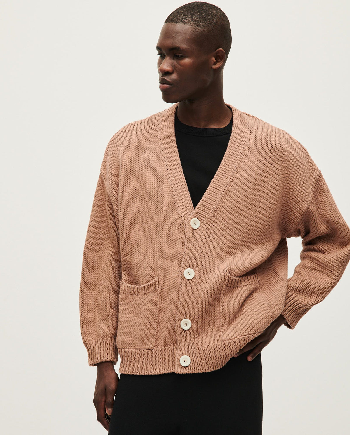Babaà men's No16 roasted fig cardigan shown in a natural knit with button front and ribbed cuffs in a cozy, stylish design.