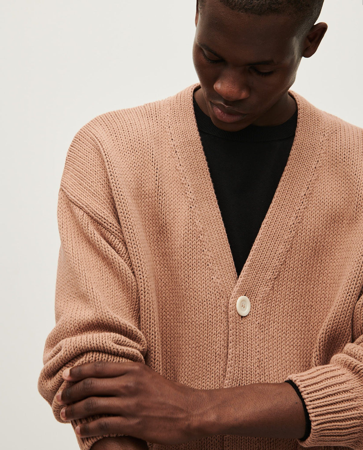 Men's Babaà No16 roasted fig cardigan featuring a cozy knit texture and button-up front, ideal for casual or smart-casual wear.
