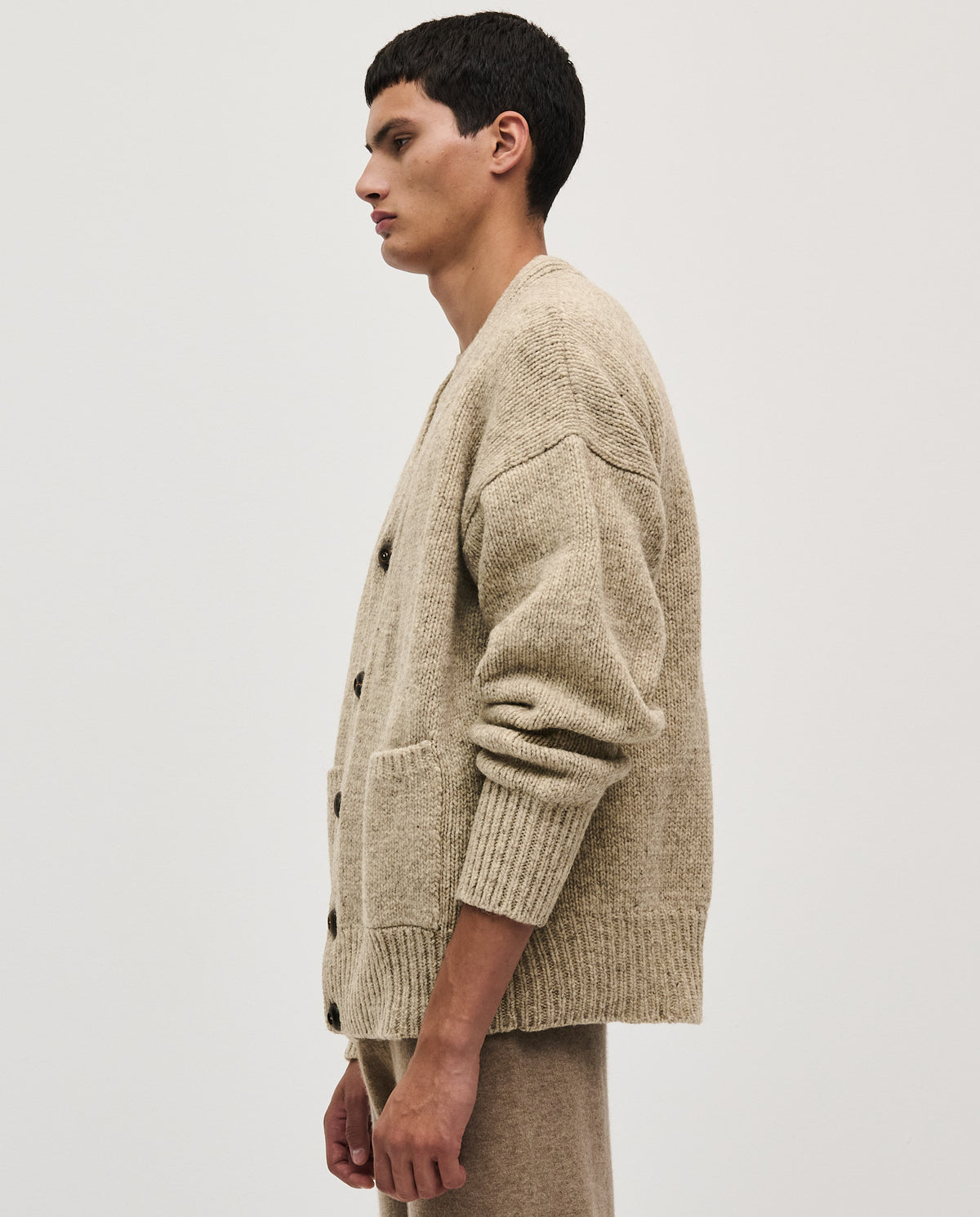 Babaà men's no17 Mist cardigan featuring a soft knit fabric, button-up front, and classic fit, styled with casual clothing.