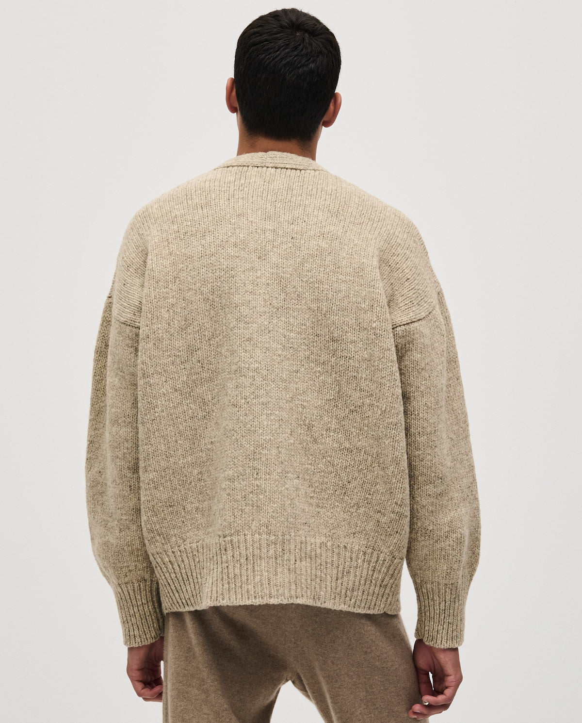 Babaà No17 Mist men's cardigan featuring a soft knit fabric and a relaxed fit, displayed in a neutral color.