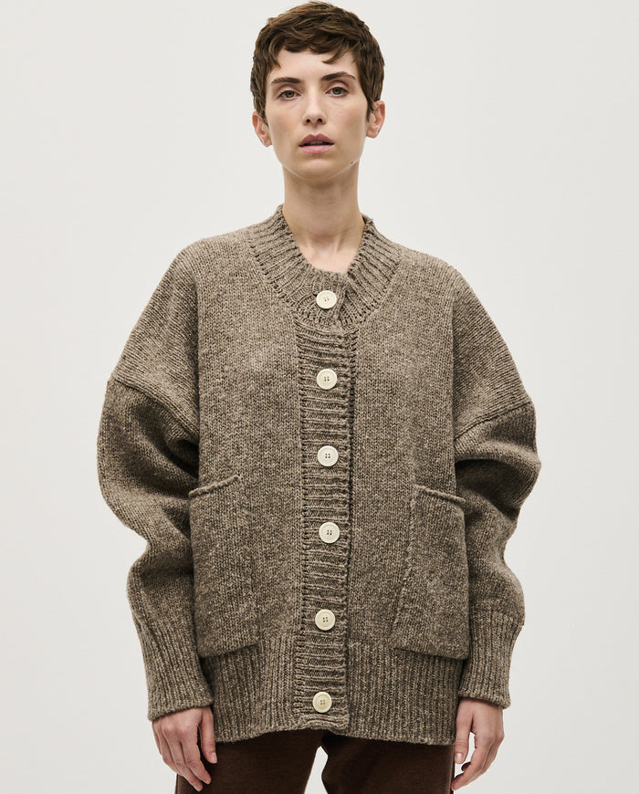 Babaà No11 dark mist women's cardigan displayed on a hanger, showcasing soft knit fabric and relaxed fit.