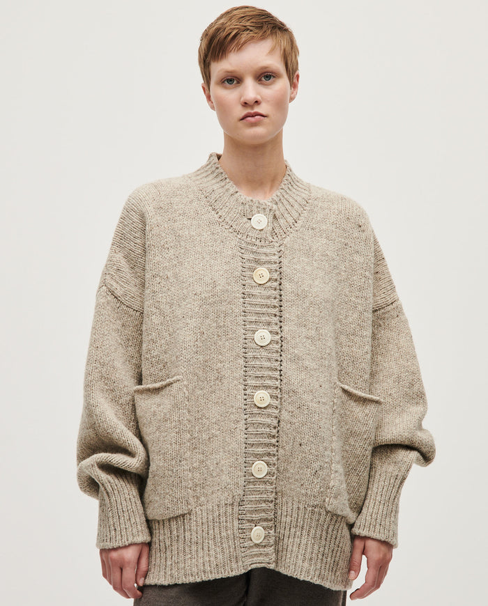 Light gray Babaà no11 Mist cardigan for women, featuring a soft knit texture and a relaxed fit, displayed on a hanger.