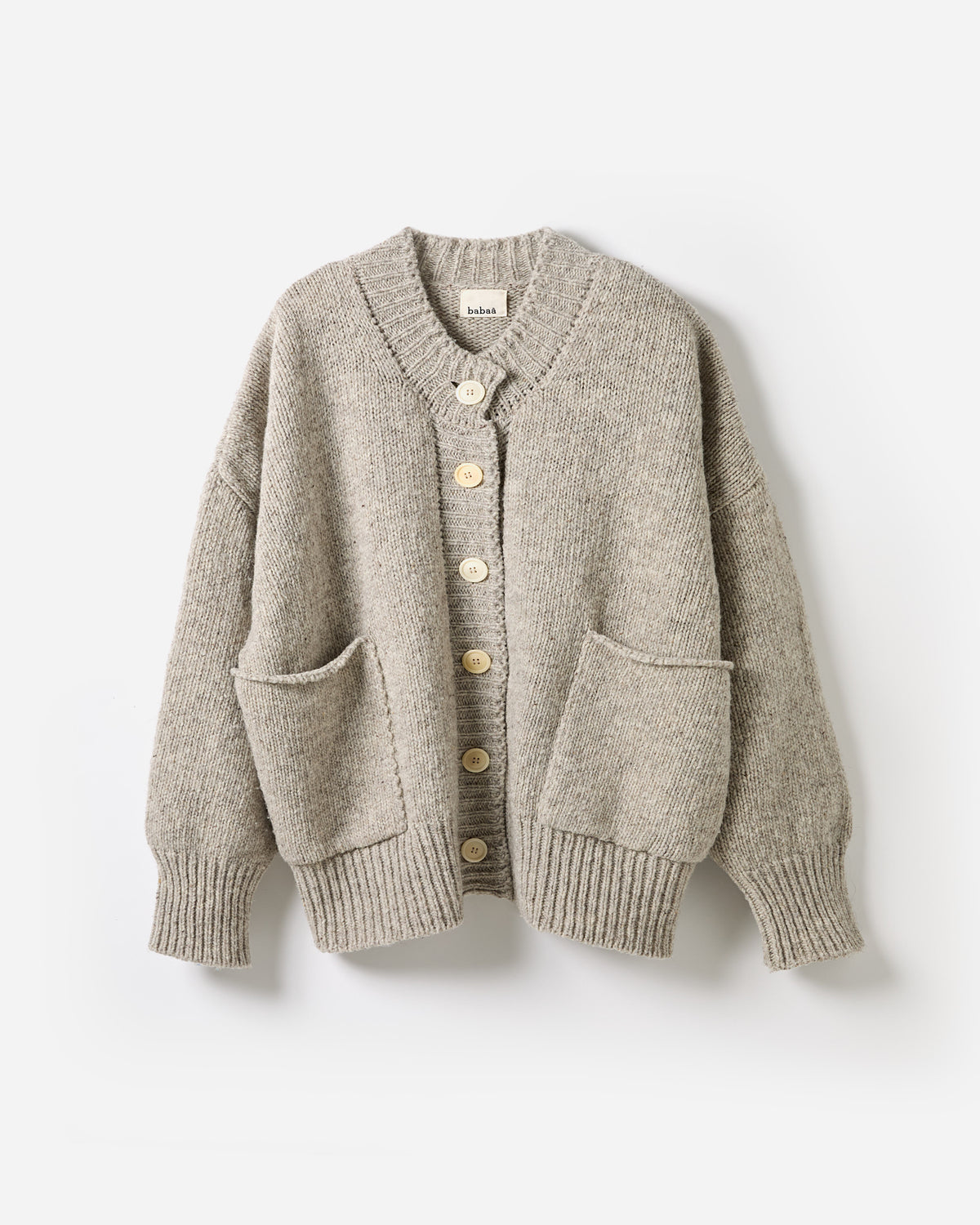 Silhouette of Babaà No11 Mist women's cardigan, soft knit fabric, draped fit, neutral color, displayed on a hanger.