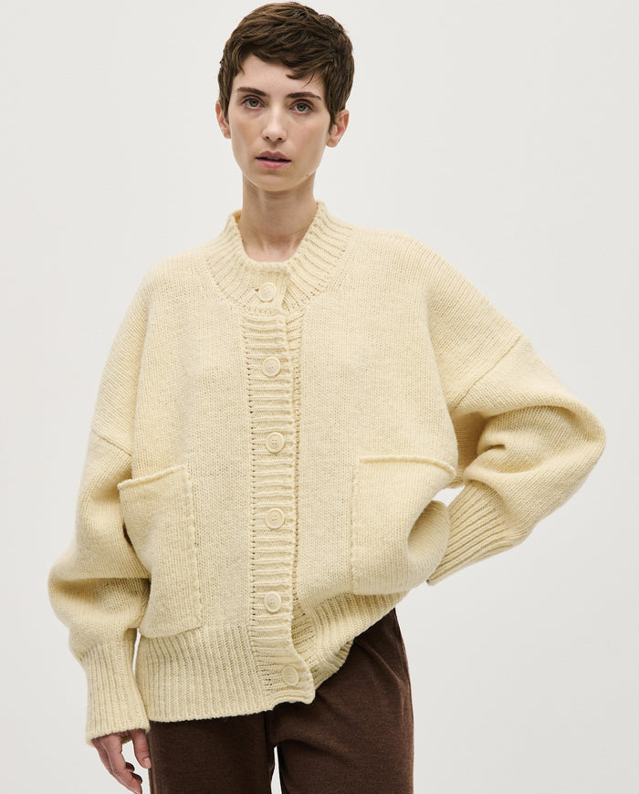 Babaà No11 natural women's cardigan showing soft knit fabric, button front design, and relaxed fit in a light neutral color.