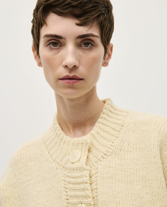Babaà No11 natural women's cardigan, soft knit with long sleeves and open front, styled on a hanger.