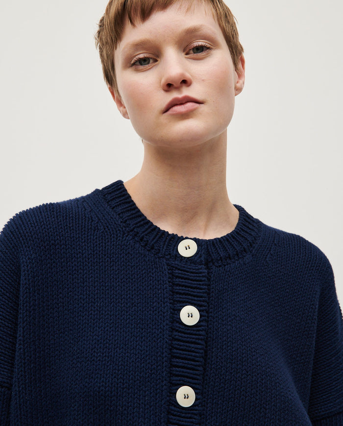 Navy Babaà No14 women's cardigan with long sleeves and button front, soft knit fabric, and ribbed cuffs and hem.