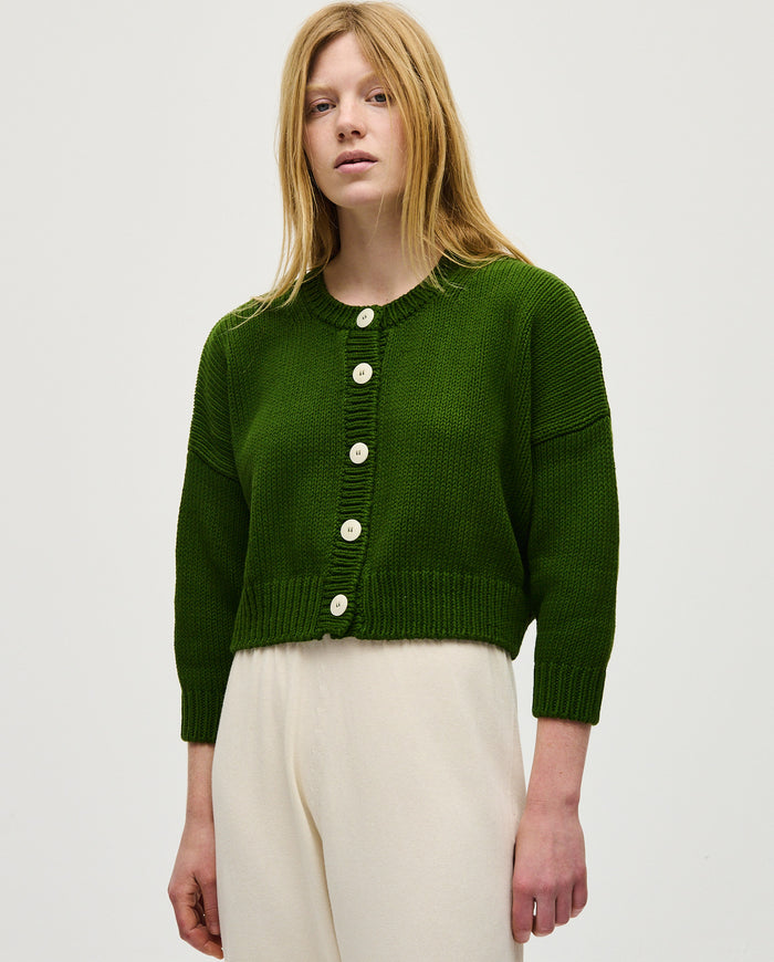 Babaà No14 Pine women's cardigan featuring a cozy knit design in a soft pine green color.