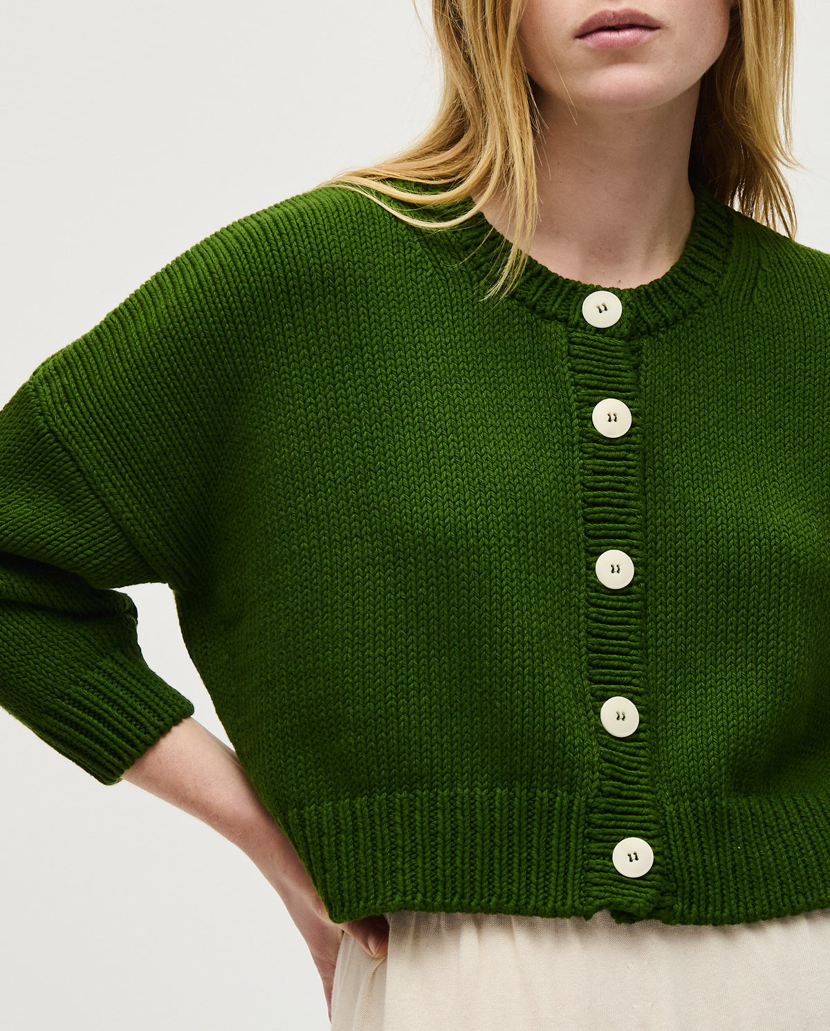 Babaà No14 Pine women's cardigan showing a soft knit fabric in a cozy, relaxed fit with long sleeves and a button-up front.