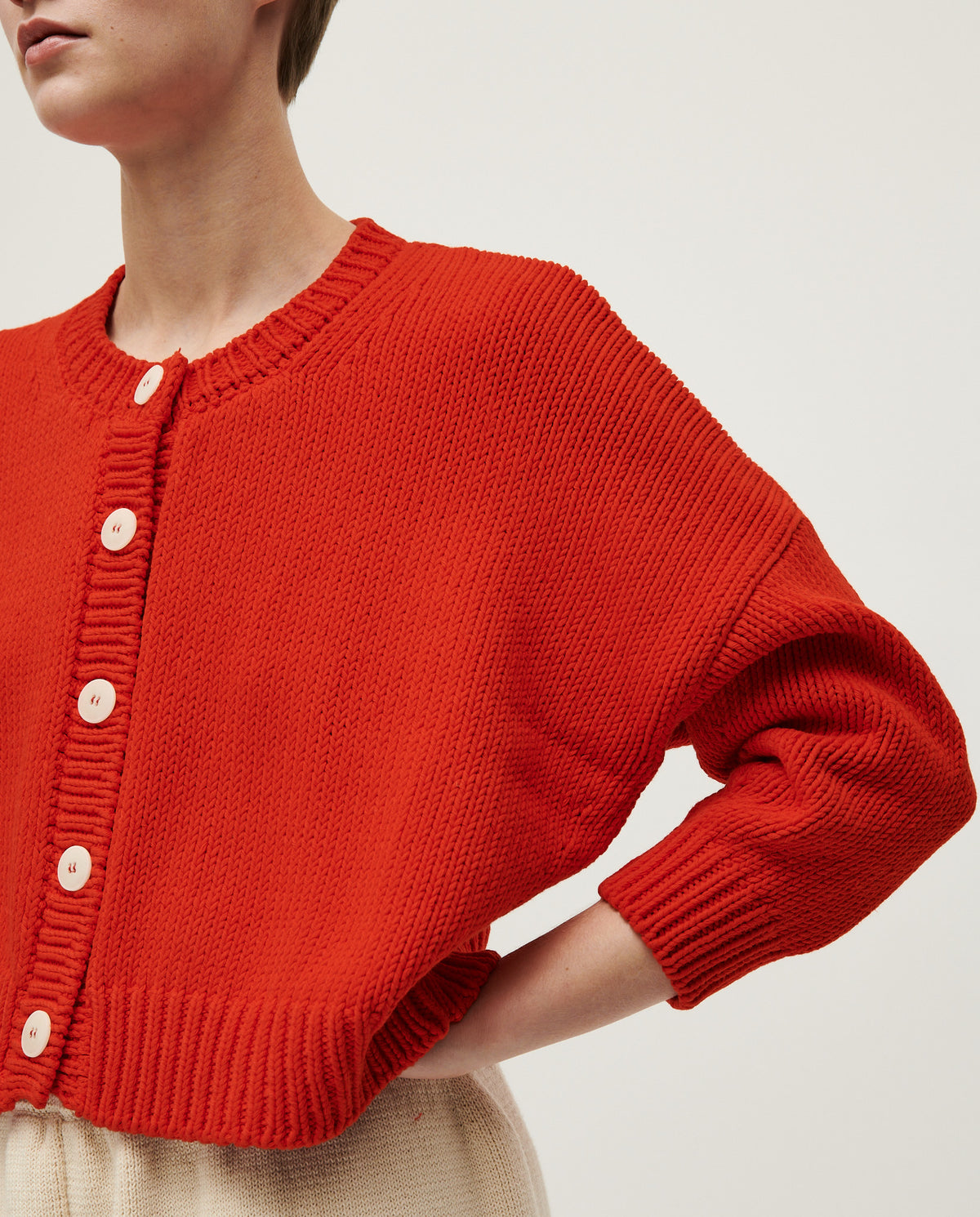 Babaà No14 Summer Flame women's cardigan in vibrant flame color, lightweight knit with long sleeves and open front design.