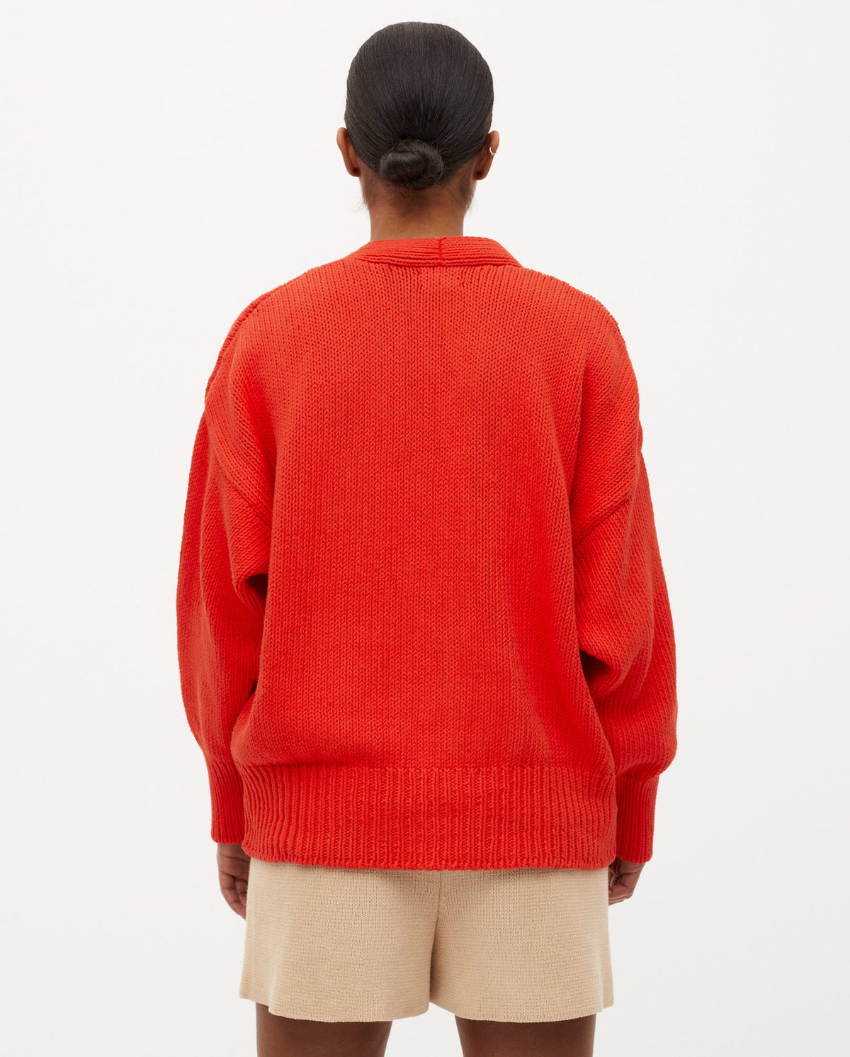Babaà No16 summer flame cardigan for women, lightweight knit with vibrant flame pattern, worn open over casual outfit.