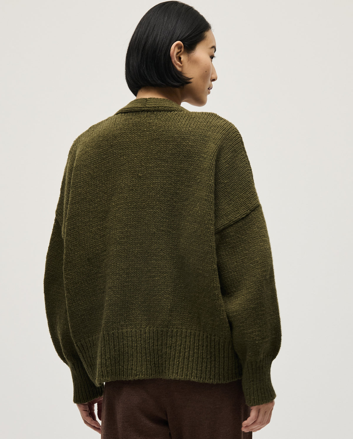Cream-colored Babaà No17 Alga women's cardigan with a relaxed fit, featuring a textured knit and open front design.
