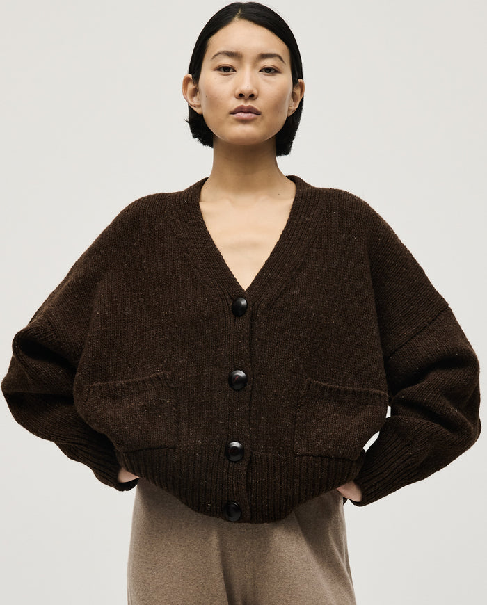 Babaà No17 Earth women's cardigan featuring a cozy knit design in earthy tones, styled with long sleeves and a front button closure.