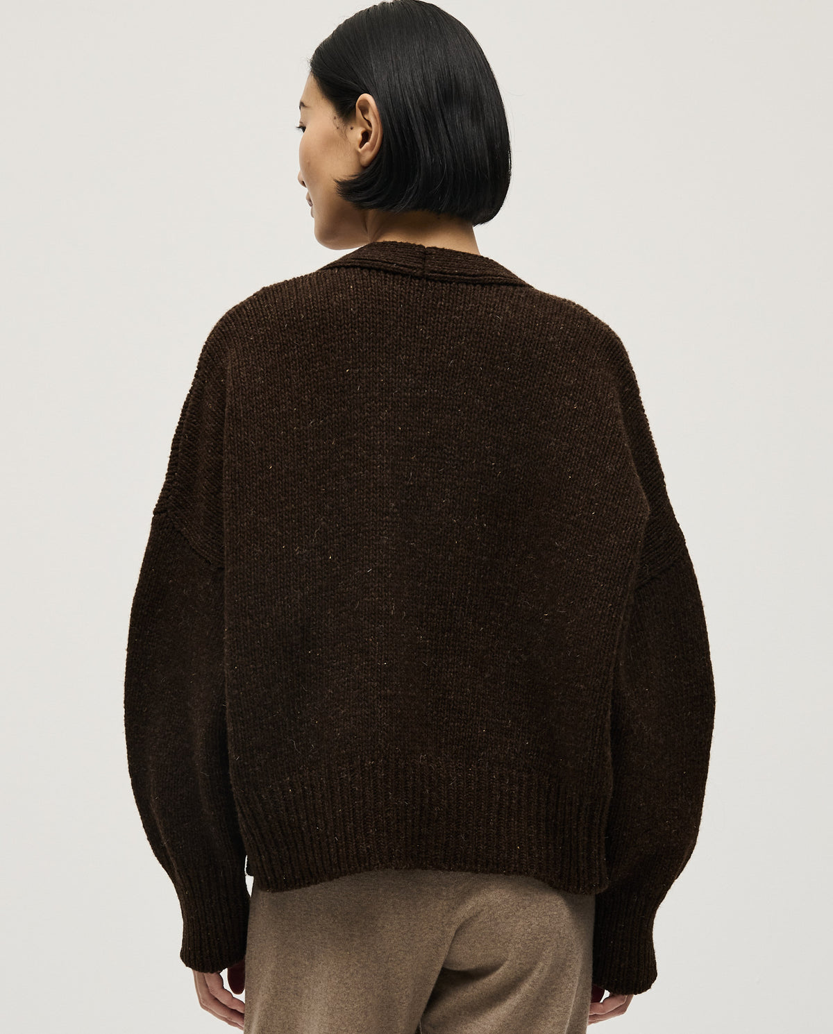 Babaà No17 Earth women's cardigan featuring earthy toned knit fabric, long sleeves, and a relaxed fit.