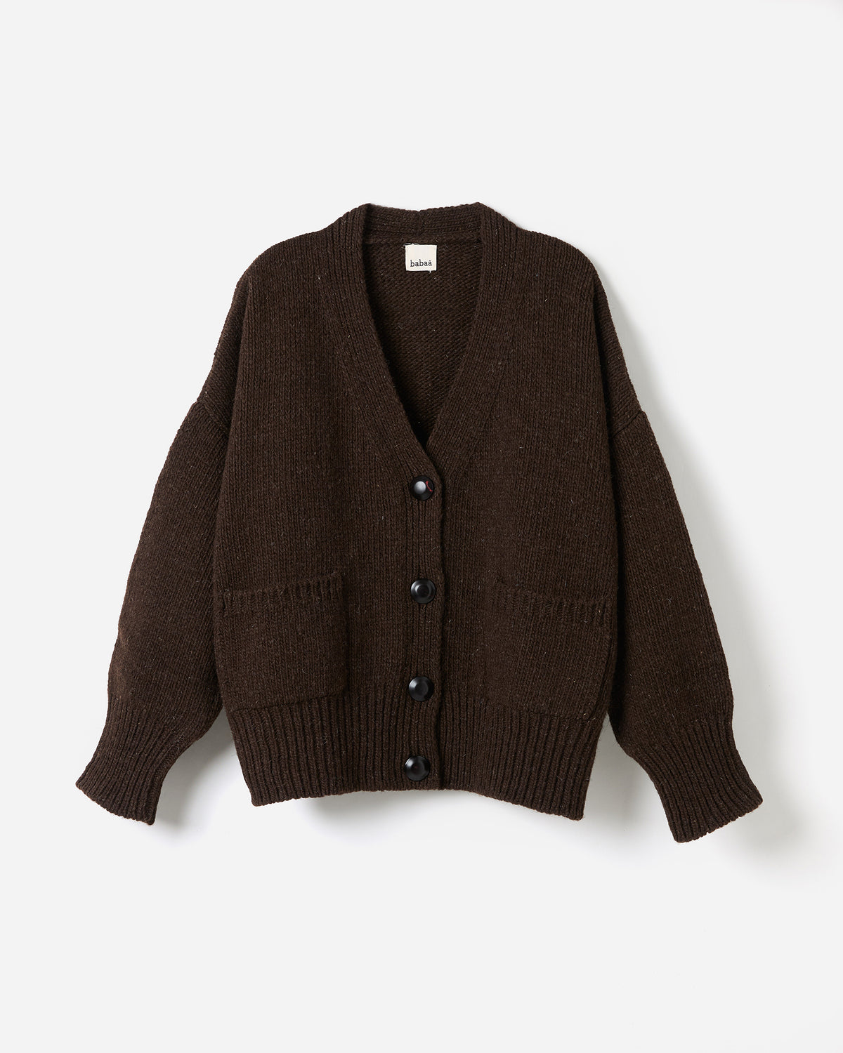 Silhouette of Babaà No17 Earth women's cardigan, showing its relaxed fit and earthy tone in a side view.