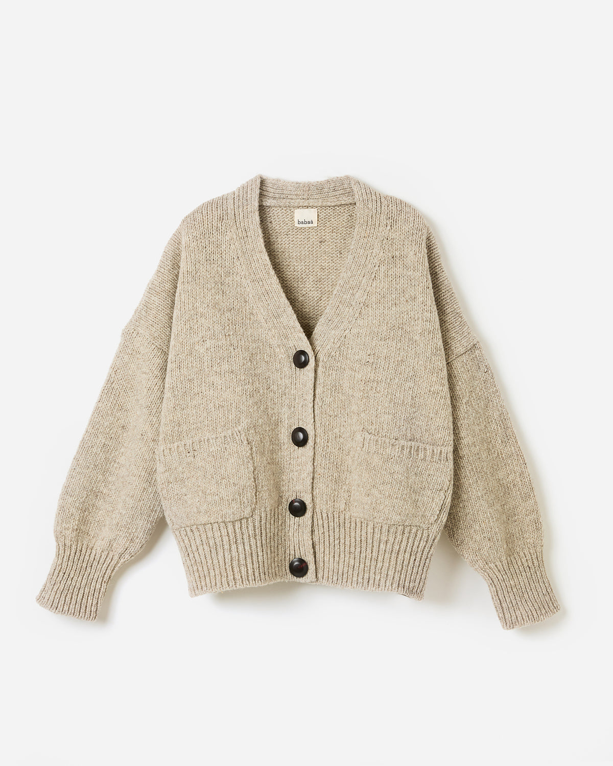 Babaà No17 Mist cardigan worn by a woman, featuring a soft, relaxed silhouette in a light, misty color.