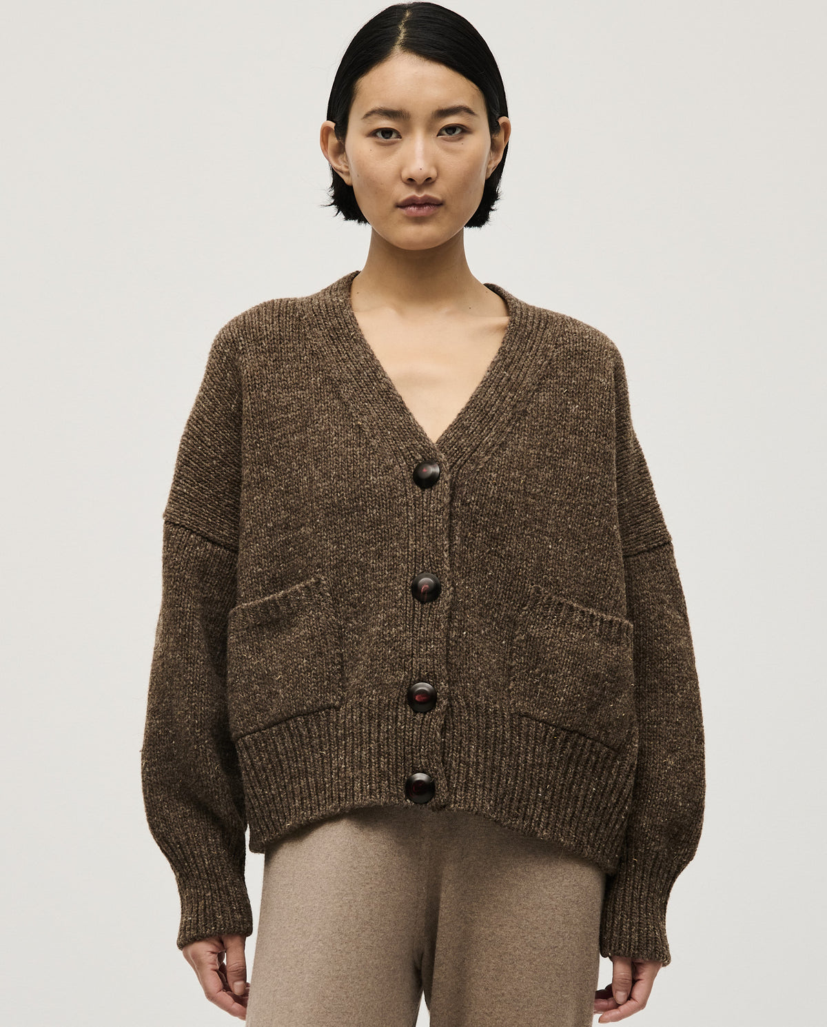 Babaà No17 Oak women's cardigan in soft knit, featuring a relaxed fit and button closure, shown in a cozy, neutral shade.