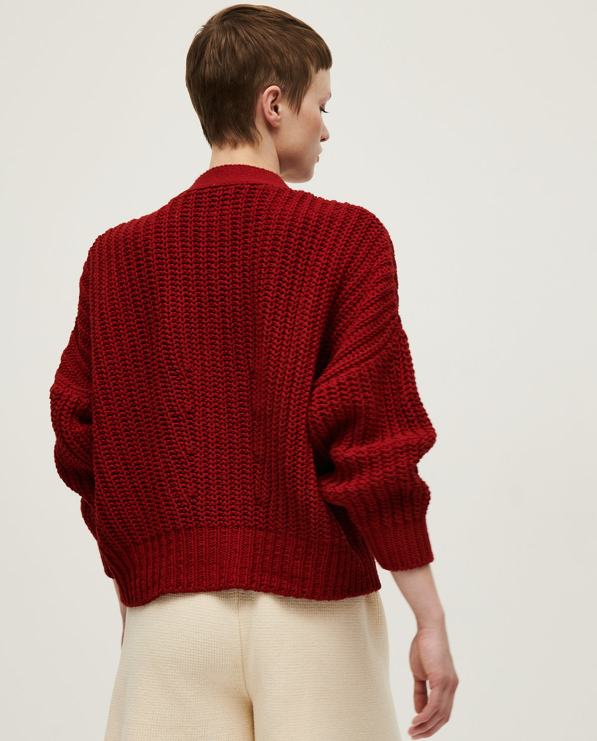 Babaà No18 Persephone women's cardigan in soft knit, featuring a relaxed fit and button closure, displayed on a model.