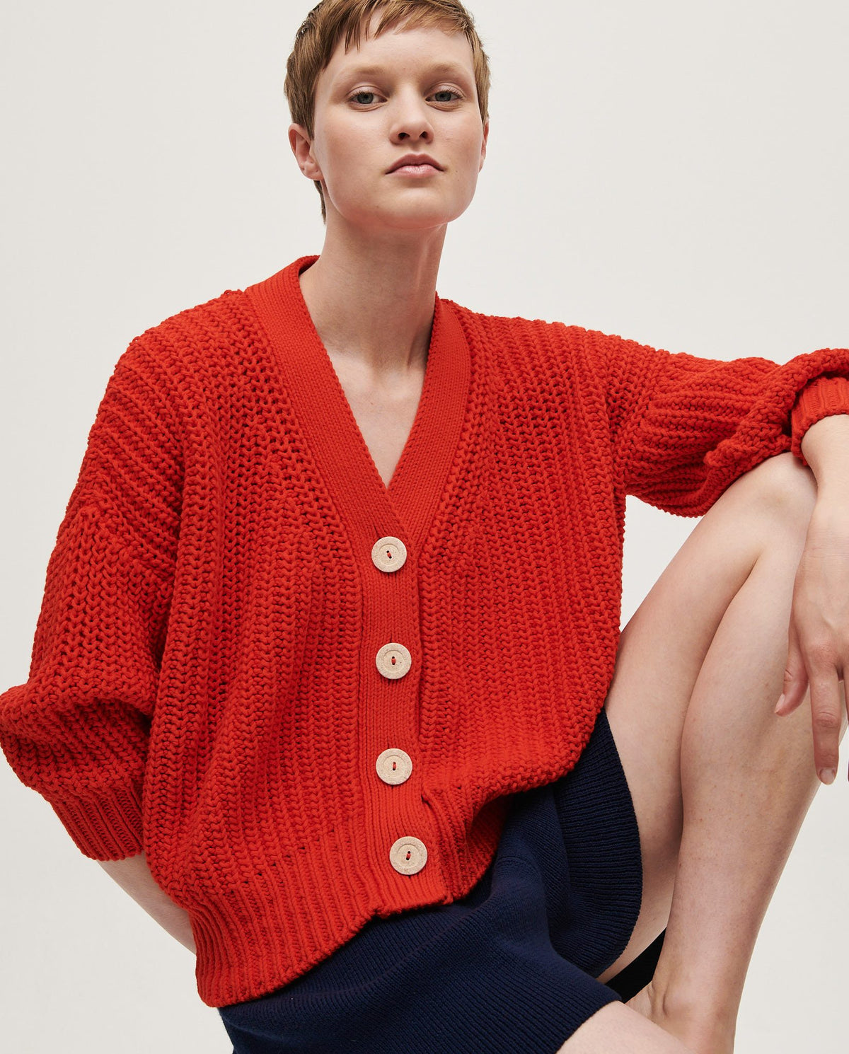 Babaà No18 Summer Flame women's cardigan in lightweight fabric with vibrant flame pattern, styled with buttons and long sleeves.