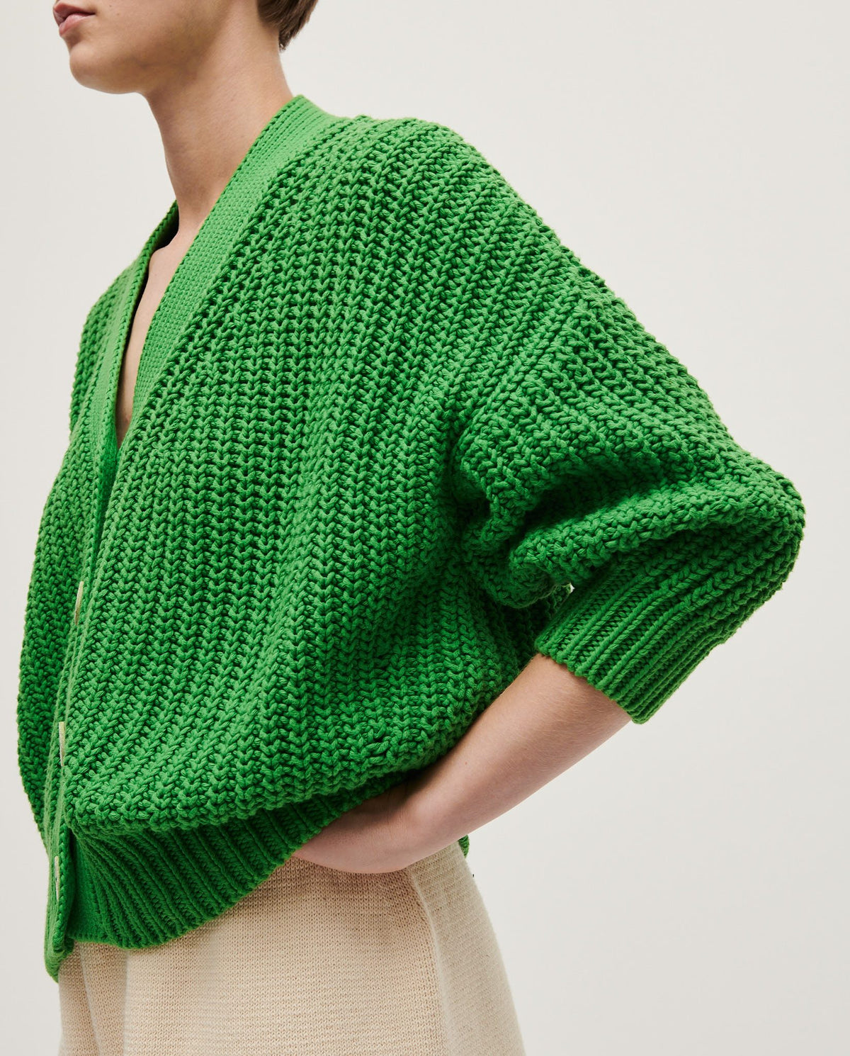 Babaà No18 Wild Fern women's cardigan featuring a cozy knit design with a botanical pattern in green and earthy tones.
