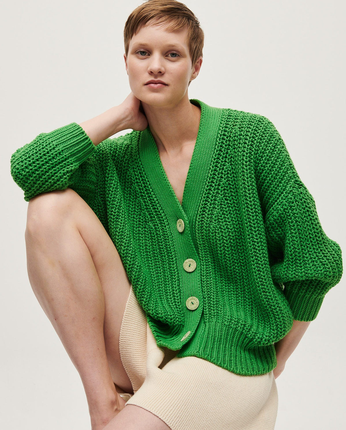 Babaà No18 Wild Fern women's cardigan in soft knit fabric with a leafy fern pattern, worn by a model.