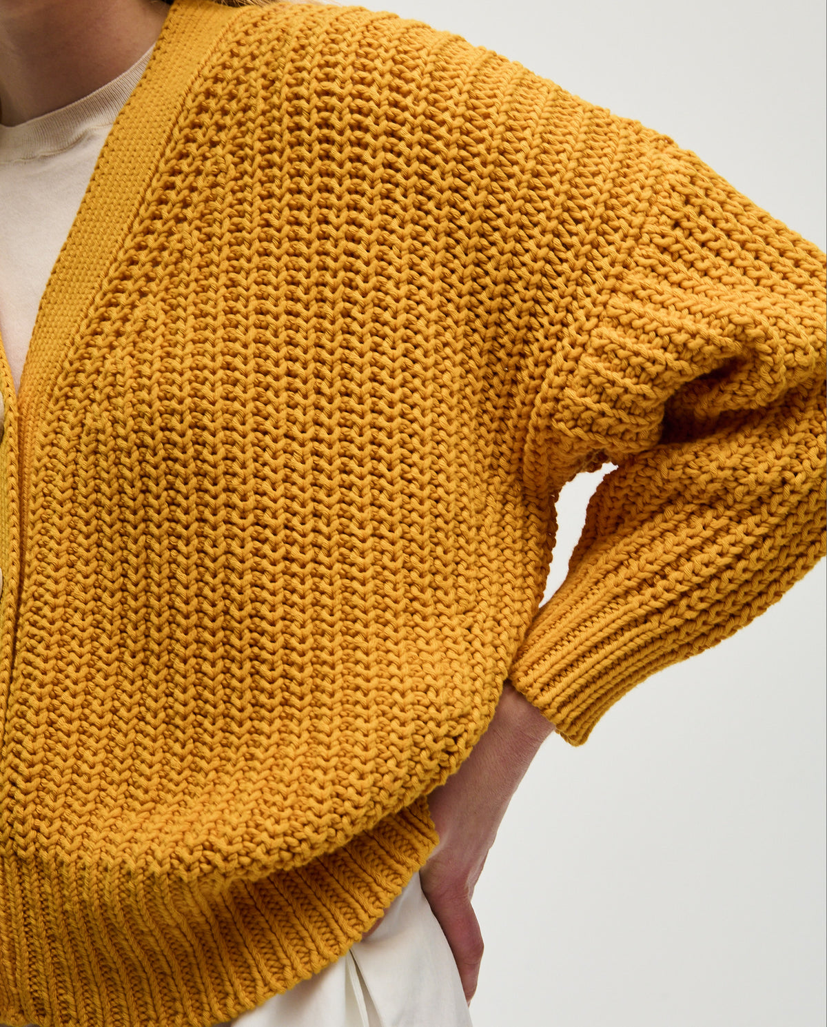 Babaà No18 Yolk women's cardigan with a soft knit texture and button closure, shown in a stylish, relaxed fit.