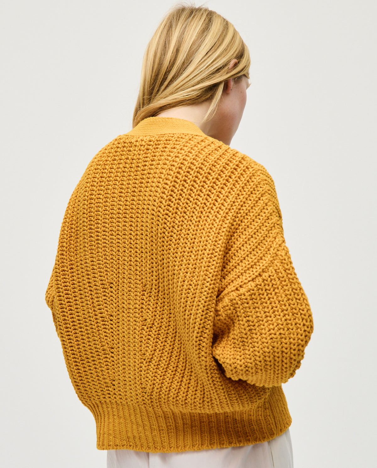 Babaà No18 Yolk women's cardigan featuring a soft knit fabric, button closure, and a cozy, stylish fit.