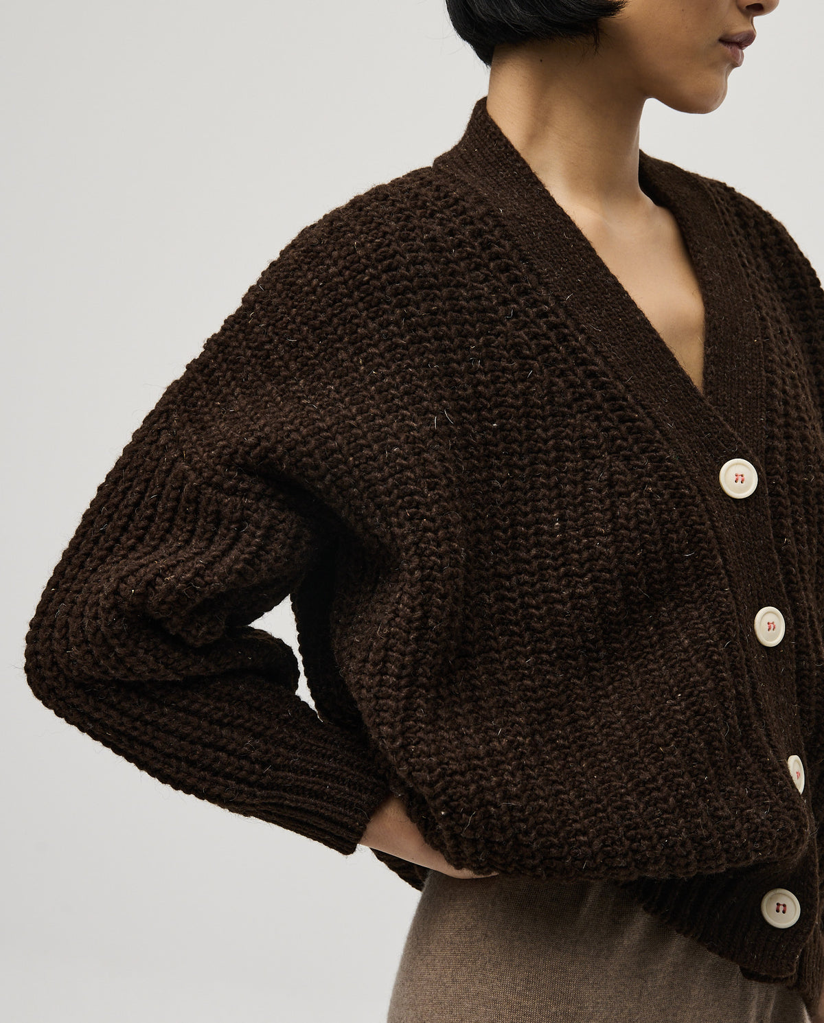 Babaà No19 Earth women's cardigan, soft knit fabric in earthy tones, long sleeves, and relaxed fit.