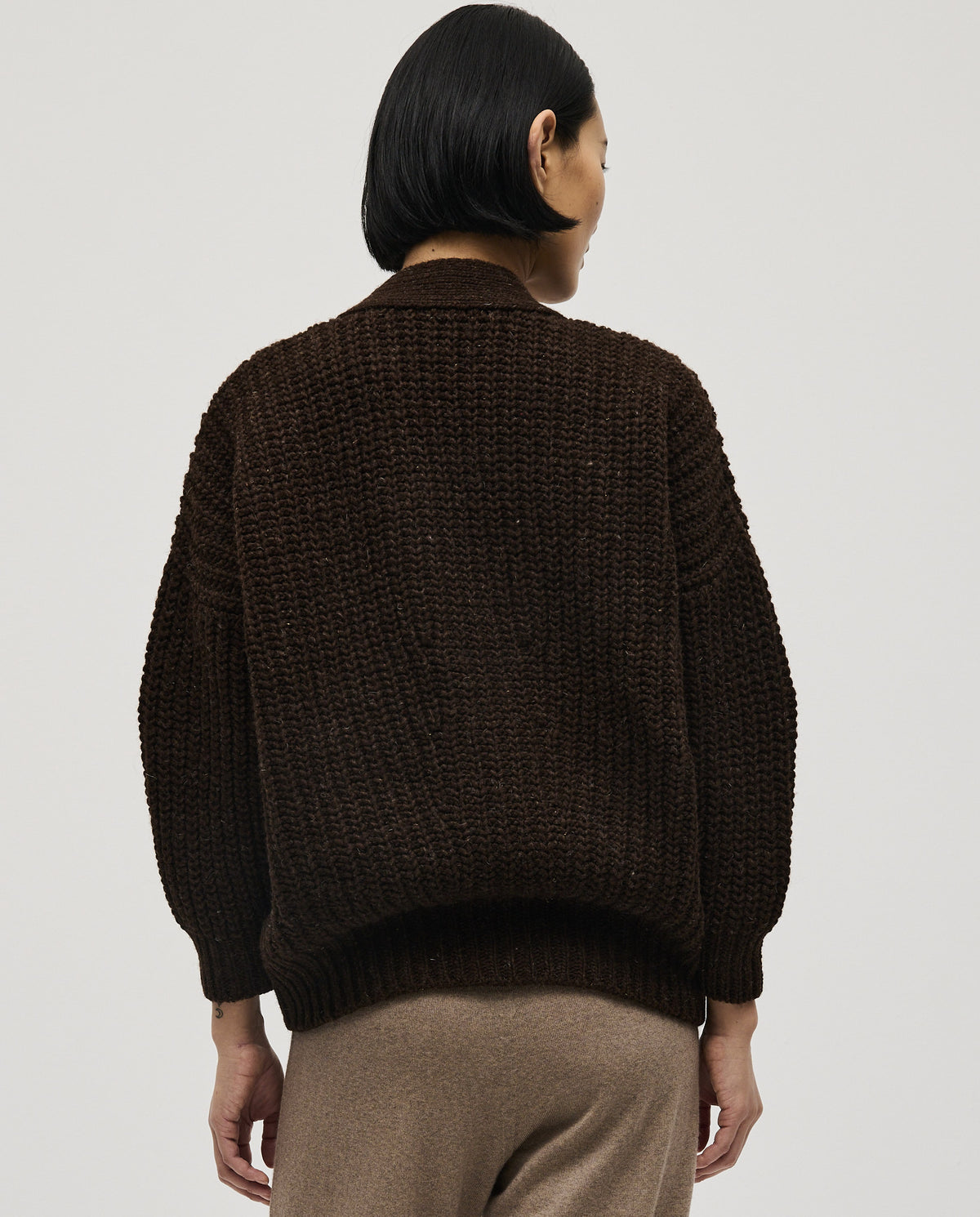 Babaà No19 Earth women's cardigan featuring a cozy knit design in earthy tones, styled with open front and long sleeves.
