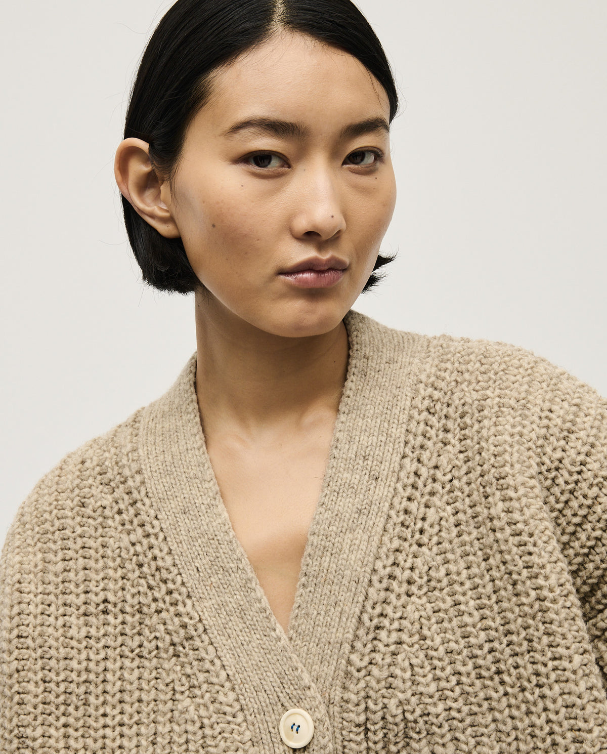 Babaà No19 Mist women's cardigan featuring a soft knit fabric, long sleeves, and a relaxed fit in a misty color tone.