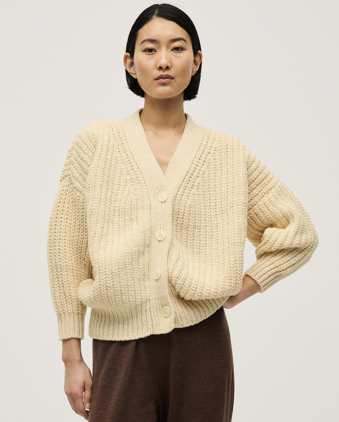 Babaà No19 natural women's cardigan featuring a soft, knitted fabric with a relaxed fit and button closure.