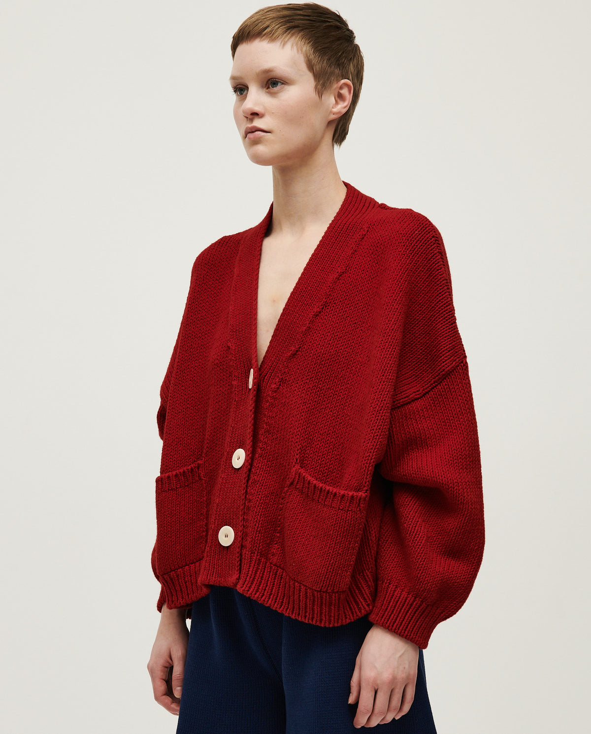 Babaà No22 Persephone women's cardigan in soft knit, featuring a relaxed fit and button closure, shown in a neutral tone.