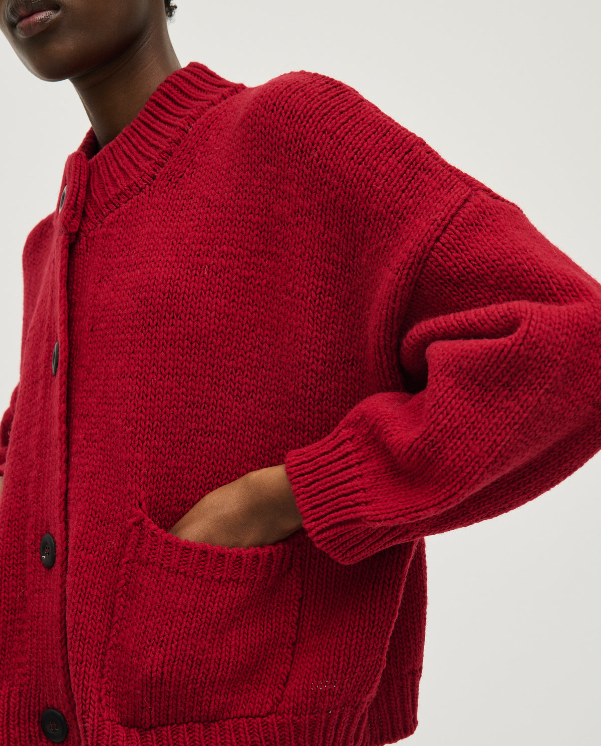 Babaà No23 Cereza women's cardigan in vibrant red, featuring a cozy knit design and button closure.