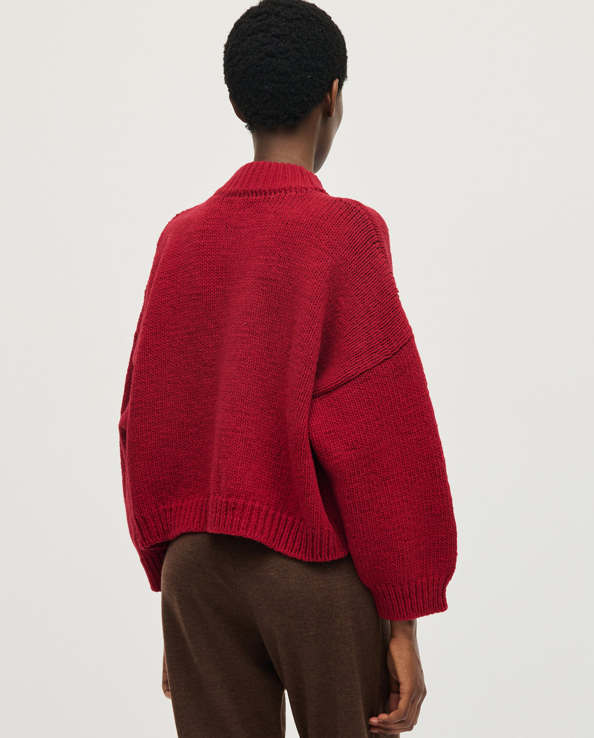 Babaà No23 Cereza women's cardigan in vibrant red, featuring a cozy knit design and button-front closure.