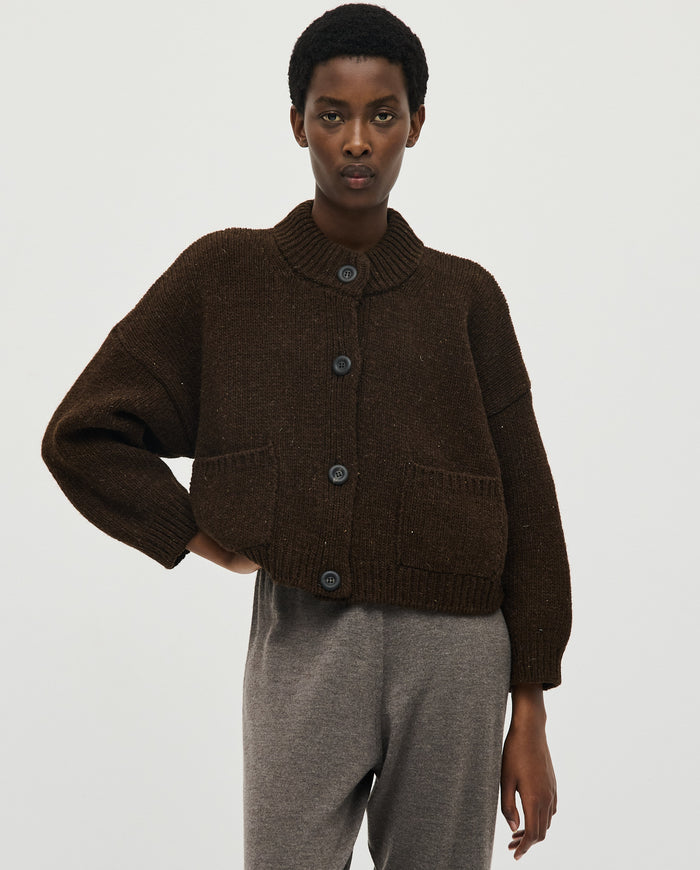 Babaà No23 Earth women's cardigan in neutral tone, soft knit fabric, button front, and relaxed fit, styled on a model.