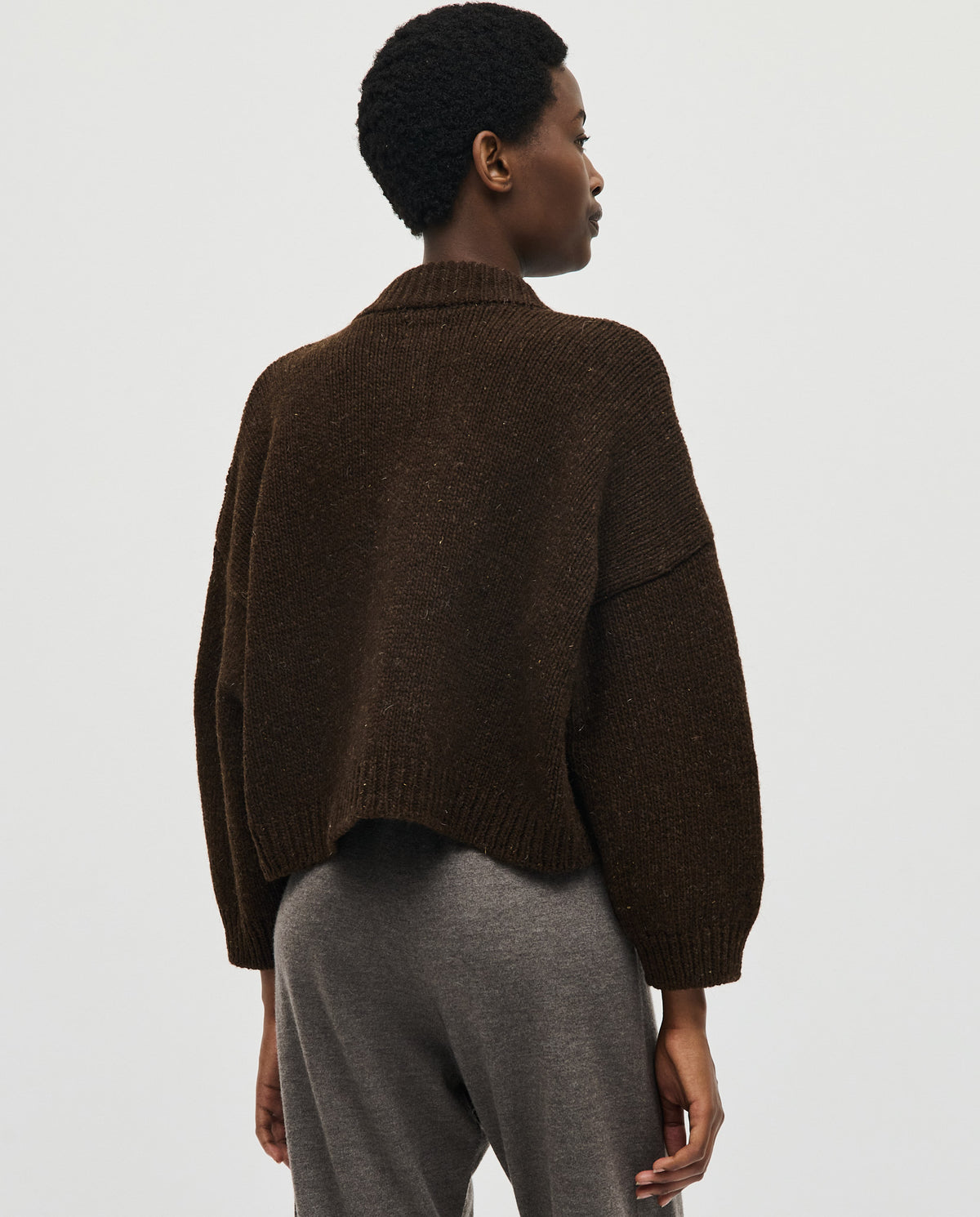 Babaà No23 Earth women's cardigan in soft, earthy tone, featuring a cozy knit design and button closure.