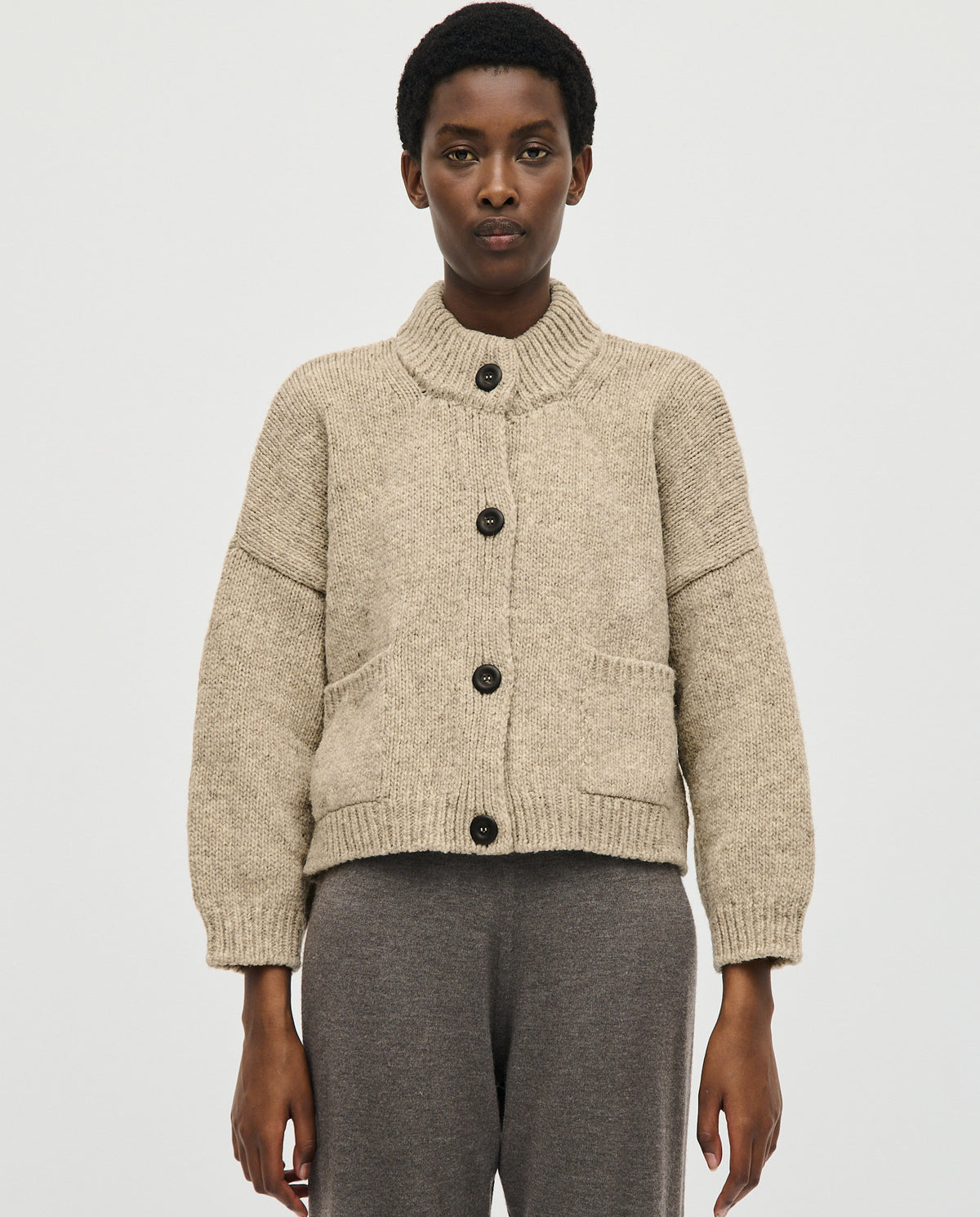 Babaà No23 Mist women's cardigan featuring soft knit fabric and a relaxed fit, displayed in a neutral color.