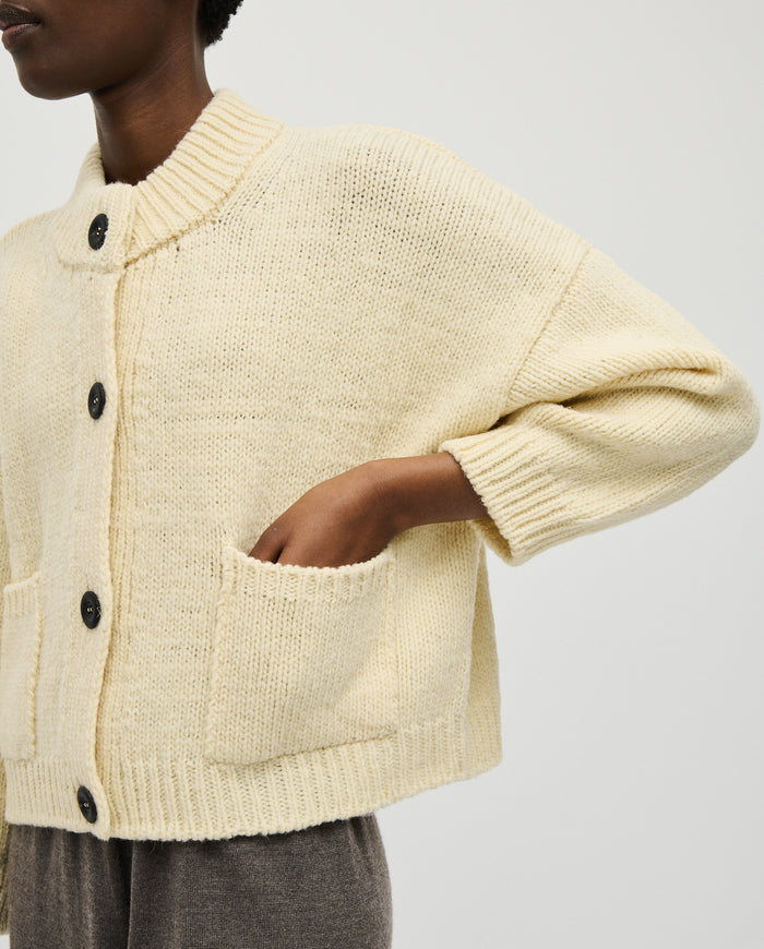 Babaà No23 natural women's cardigan featuring a soft, neutral knit fabric and classic button front design.
