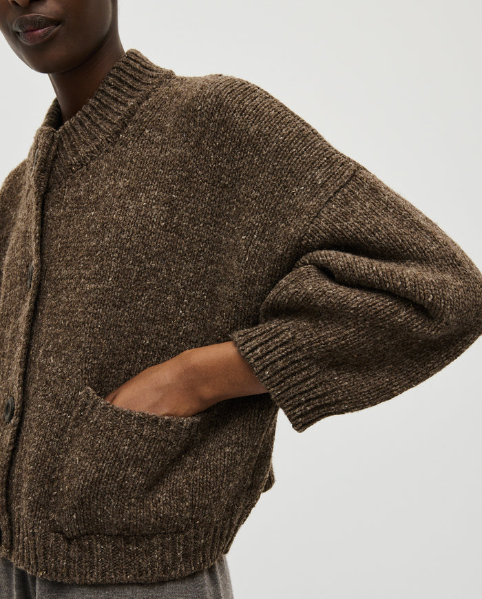 Babaà No23 Oak women's cardigan featuring a cozy knit design in soft oak color, with button details and long sleeves.